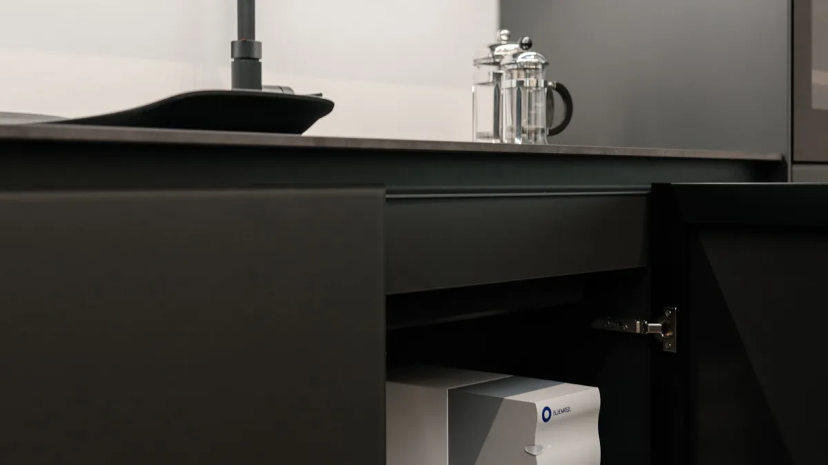 A clean modern kitchen sink and faucet with a reverse-osmosis filtration setup